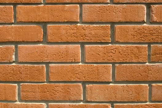 Wall  laid out by red bricks.