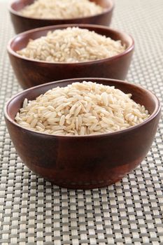 Several bowls of healthy organic basmati rice.