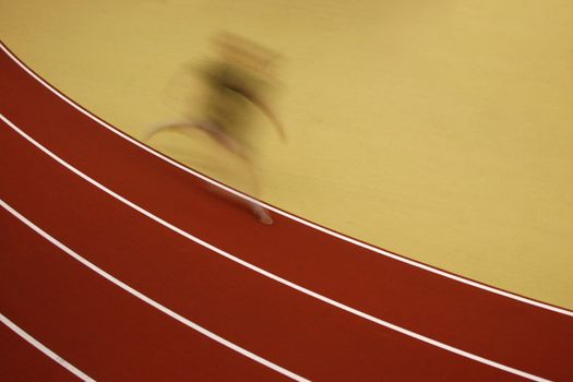 Motion blurred athlete at the track