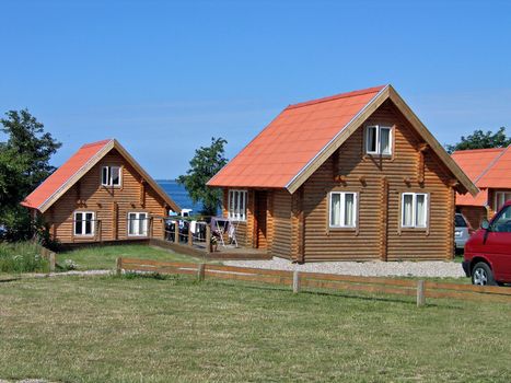 Wood log homes summer houses in a vacation village