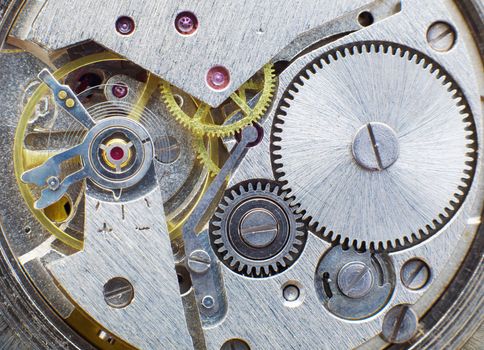 Photo of an ancient metal clockwork (macro-photo)