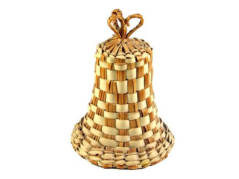 Handmade wicker straw bell isolated on white