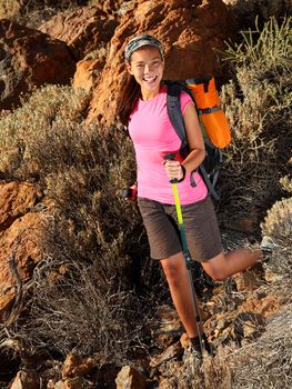 Female hiker. Young asian female model hiking / backpacking in beautiful volcanic landscape on the volcano, Teide, Tenerife, Spain. 