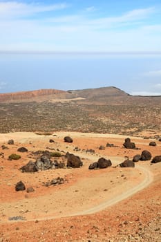 Teide landscape on Tenerife. A view of the hiking path at Monta�a Blanca within the national park showing a lot of the black Teide eggs or in Spanish: Los Huevos del Teide.