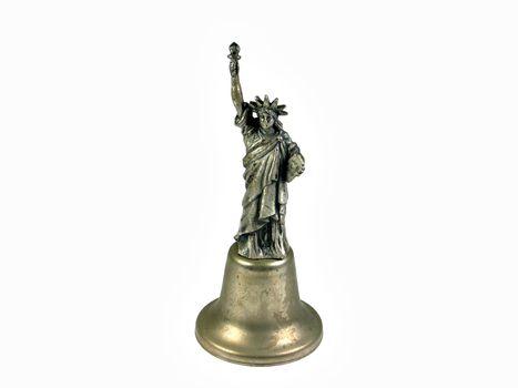 Statue of Liberty replica metal bell isolated on white