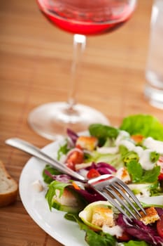 fresh salad on a white plate