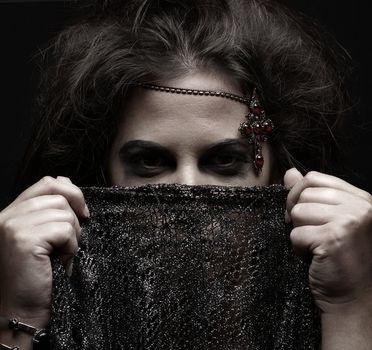 Portrait of arabic woman over dark background              