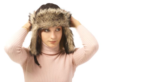 Attractive young woman wearing winter hat  isolated on white