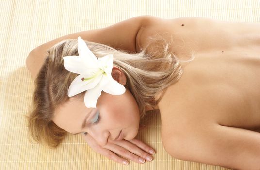 Attractive woman getting spa treatment isolated on white