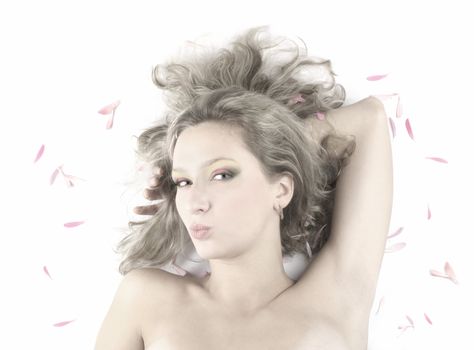 Young beautiful woman dreaming on white      
