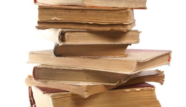 Ancient vintage books isolated on white background