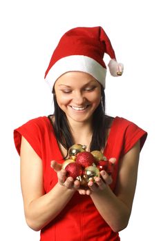 Young attractive adult female with Christmas balls isolated on white             