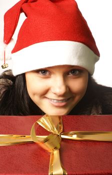 Young attractive adult female with big present isolated on white             