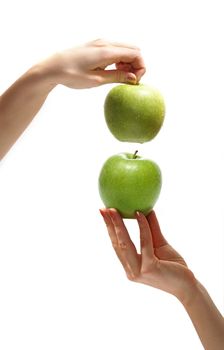 Tasty sweet apples in graceful woman's hands     
