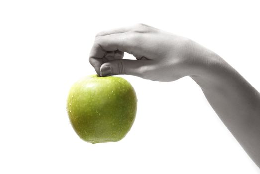 Tasty sweet apple in graceful woman's hand     
