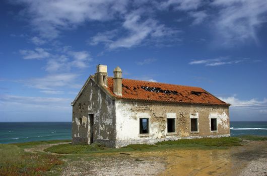 Beautiful scene of an old abandoned house close to the coast 