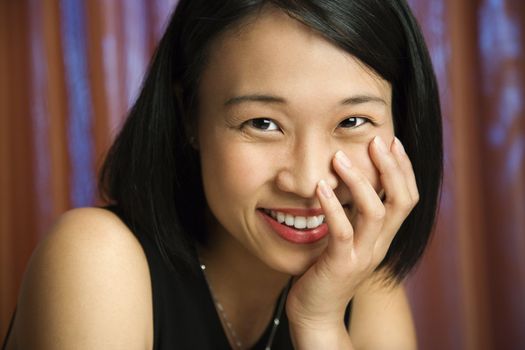 Prime adult Asian female portrait.