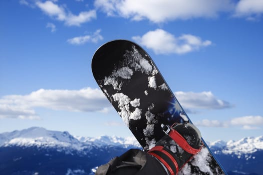 Snowboard and mountain.