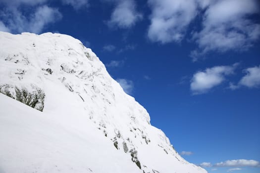 Snow-covered mountainside.