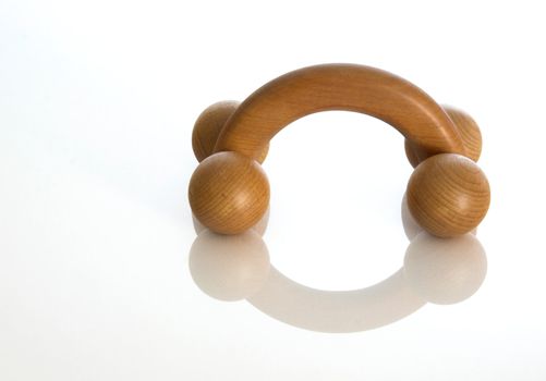 Wood Massager on a white background with reflection