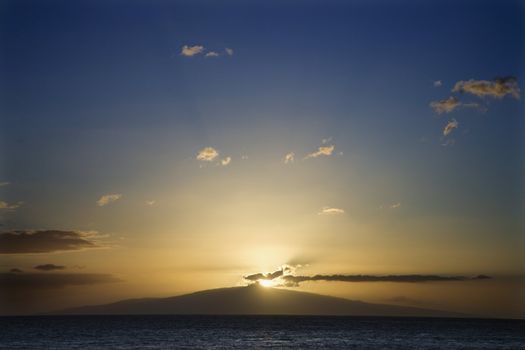 Sunset over the coast of Kihei, Maui, Hawaii, USA.