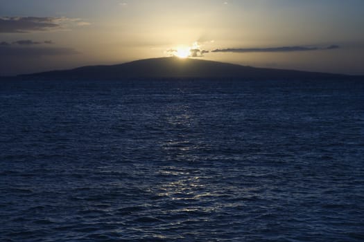 Sunset over the coast of Kihei, Maui, Hawaii, USA.