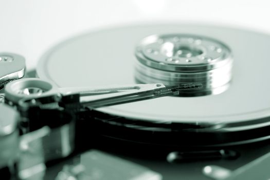 Open hard disk drive - shallow depth of field with focus on the needle