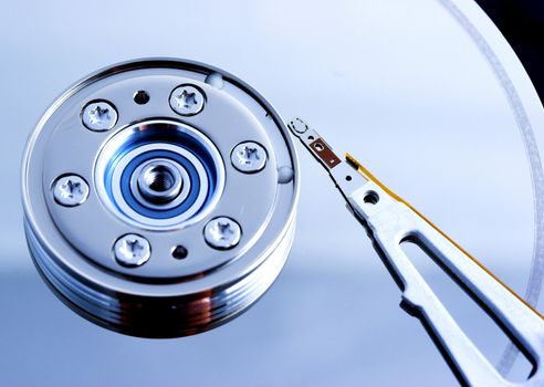 Open hard disk drive - shallow depth of field with focus on the needle