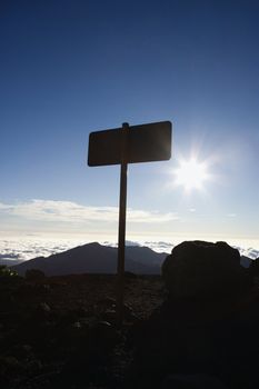 Silhouetted sign in Haleakala National Park in Maui, Hawaii.