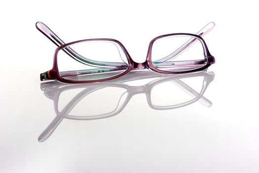 Glasses isolated in a white background with reflection