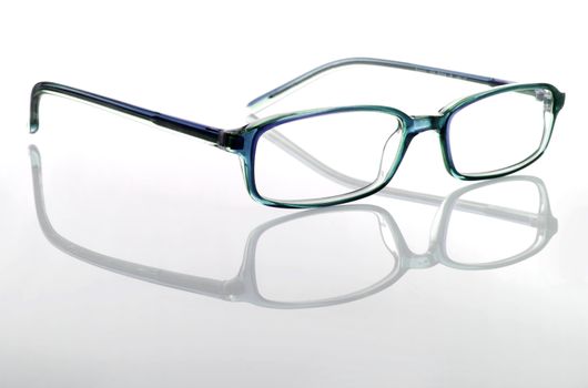 Glasses isolated in a white background with reflection
