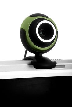 Digital webcam in a white background with reflection