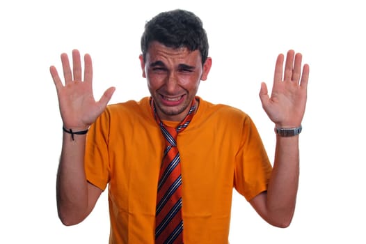 Frustrated man with orange tie and hand in the air