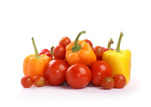 Tomatoes and paprika isolated on white                