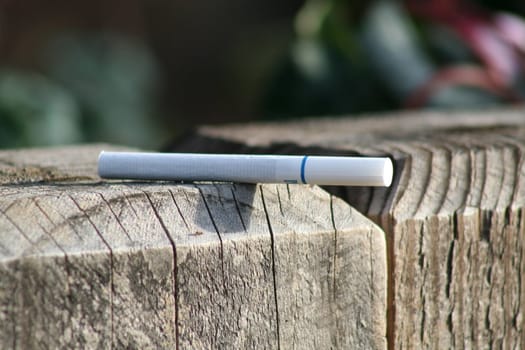 Close up of a cigarette.