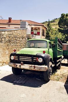The old british lorry which costs in rural street on Chyprus