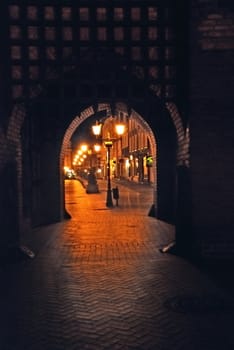 Very old, stylish, Czluchowska gate in Poland in county Pomerania, Chojnice city. Standing still from first world war. Photo taked in night.