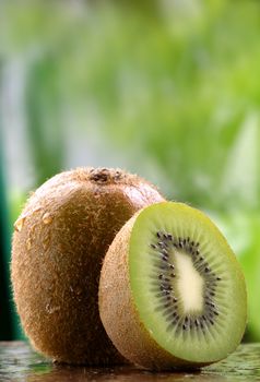Organic kiwi fruit on a stone counter.