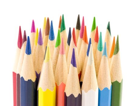 Stack of colored hexagon shaped pencils macro, shallow focus