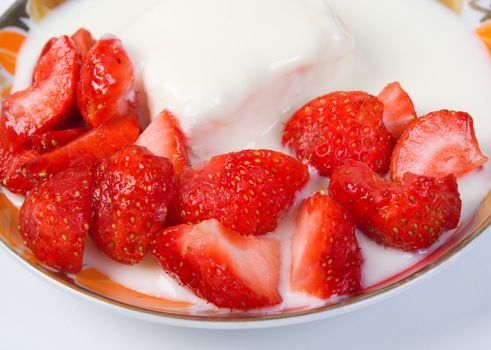 Strawberries and yogurt.Cottage cheese