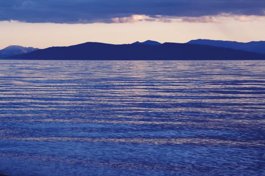 Lake Khubsugul. Mongolia. A kind on peninsula. At mongols it as a barometre: if its silhouette dark - to be to a bad weather.