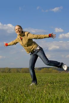 Girl playing on the grass