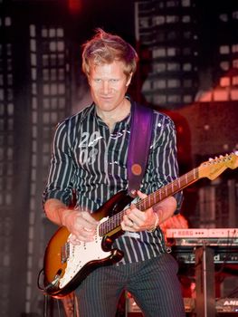 Duran Duran guitarist Dom Brown live on stage in Malta on 26th July 2008 during Red Carpet Massacre Tour