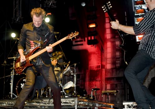 Duran Duran bassist John Taylor live on stage in Malta on 26th July 2008 during Red Carpet Massacre Tour