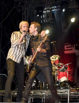 Duran Duran frontman and vocalist Simon Le Bon and John Taylor live on stage in Malta on 26th July 2008 during Red Carpet Massacre Tour