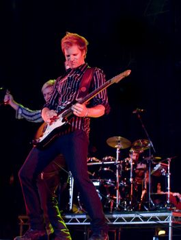 Duran Duran guitarist Dom Brown live on stage in Malta on 26th July 2008 during Red Carpet Massacre Tour