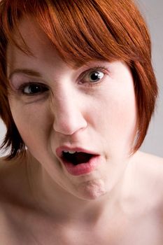 Red haired girl with emotive faces and expressions