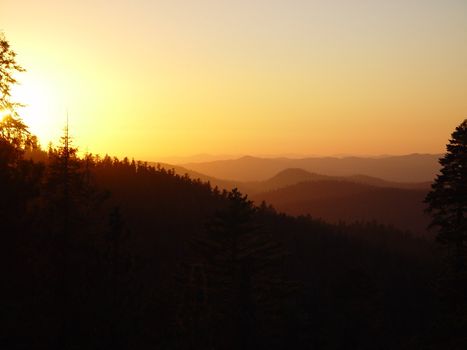 A man assisted sunset with extra color from pollution