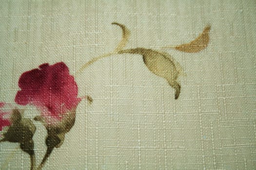 A flower print on cloth with texture.