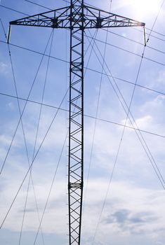 High-voltage line with wires on a background of the sky. 